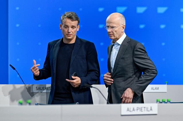 13 May 2025, Baden-Württemberg, Mannheim: Christian Klein (l), CEO of the software group SAP, and Pekka Ala-Pietilae, Chairman of the Supervisory Board, take the stage at the Annual General Meeting of the software group SAP. Photo: Uwe Anspach/dpa