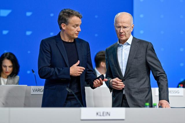13 May 2025, Baden-Württemberg, Mannheim: Christian Klein (l), CEO of the software group SAP, and Pekka Ala-Pietilae, Chairman of the Supervisory Board, take the stage at the Annual General Meeting of the software group SAP. Photo: Uwe Anspach/dpa