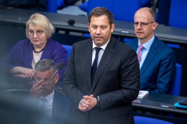 14 May 2025, Berlin: Lars Klingbeil (R), German Finance Minister, speaks during the government questioning in the plenary session of the Bundestag. Photo: Michael Kappeler/dpa