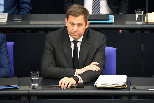 14 May 2025, Berlin: Lars Klingbeil (R), German Finance Minister, attends the government questioning in the plenary session of the Bundestag. Photo: Katharina Kausche/dpa