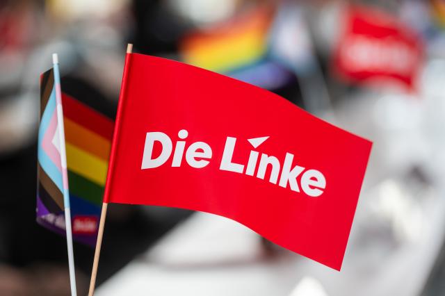 17 May 2025, Berlin: Small flags with the Die Linke party logo stand on a table at the Berlin Left Party conference. Among other things, a new state executive committee is elected at the Berlin Left Party conference. Photo: Christophe Gateau/dpa