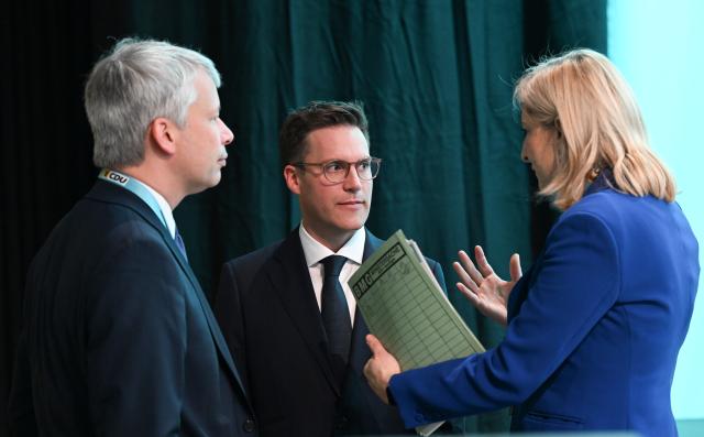 17 May 2025, Baden-Württemberg, Stuttgart: (L-R)Steffen Bilger, Christian Democratic Union of Germany (CDU) First Parliamentary Secretary, Manuel Hagel, CDU Baden-Württemberg State Chairman, and Nina Warken, Federal Health Minister, confer before the CDU state party conference begins. Photo: Bernd Weißbrod/dpa