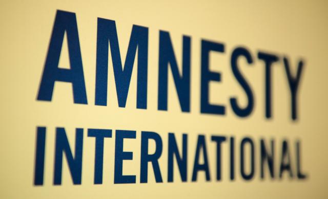FILED - 09 December 2011, Berlin: The logo of the human rights organization Amnesty International is pictured in Berlin. Photo: Sebastian Kahnert/dpa