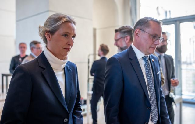 21 May 2025, Berlin: Alice Weidel (L) and Tino Chrupalla, Parliamentary group leaders of the Alternative for Germany (AfD) party, arrive to give give a press statement in the Bundestag. Photo: Michael Kappeler/dpa