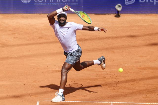 21 May 2025, Hamburg: US tennis player Frances Tiafoe in action against Spain's Roberto Bautista Agut during their men's singles round of 16 tennis match of the Hamburg European Open. Photo: Frank Molter/dpa