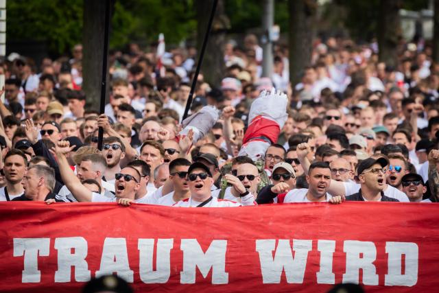 24 May 2025, Berlin: Stuttgart fans march from Theodor-Heuss-Platz to Olympischer Platz ahead of the German DFB Cup final soccer match against Arminia Bielefeld. Photo: Christoph Soeder/dpa