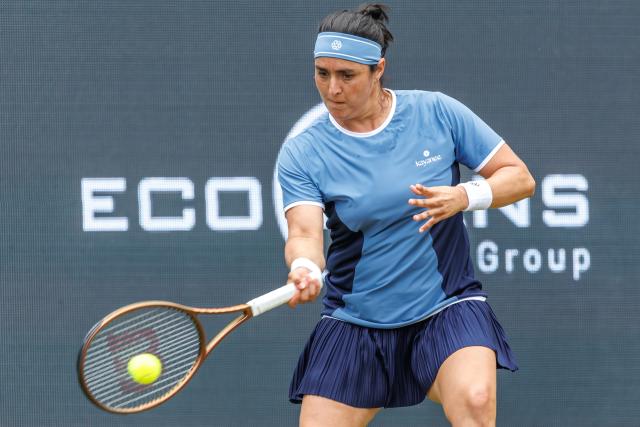 16 June 2025, Berlin: Tunisian tennis player Ons Jabeur in action against US Caroline Dolehide during their women's singles first round match of the Berlin Open tennis tournament Photo: Andreas Gora/dpa