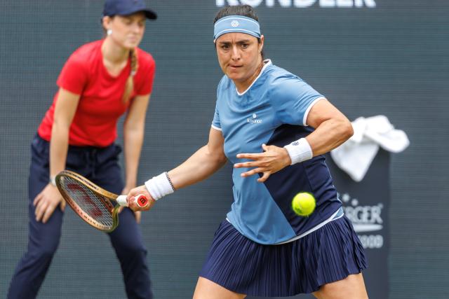 16 June 2025, Berlin: Tunisian tennis player Ons Jabeur in action against US Caroline Dolehide during their women's singles first round match of the Berlin Open tennis tournament. Photo: Andreas Gora/dpa
