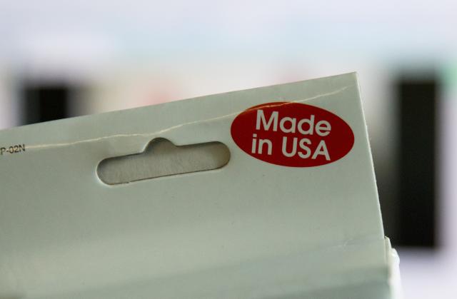 FILED - 17 March 2017, Berlin: "Made in USA" can be read on the packaging of a product. The Trump mobile phone is no longer being billed as "Made in the USA" as it was when the idea was launched, but is now being advertised as "designed with American values in mind," according to the Trumpmobile.com website. Photo: Kay Nietfeld/dpa