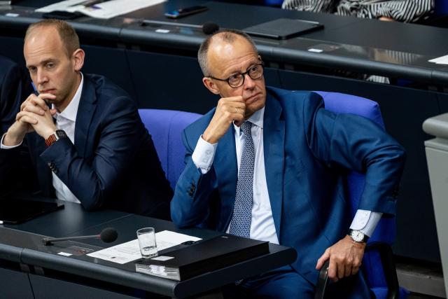 27 June 2025, Berlin: German Chancellor Friedrich Merz (R) takes part in a session of the Bundestag. Topics of the session include a vote on the suspension of family reunification and the first reading of a bill to amend the naturalization law. Photo: Fabian Sommer/dpa