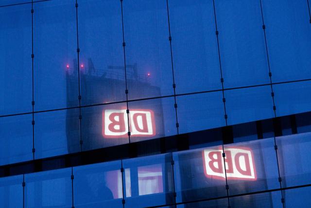 FILED - 27 March 2025, Berlin: The Deutsche Bahn AG logo is reflected in the glass façade of the office building at Berlin Central Station. Deutsche Bahn AG's annual press conference is being held in Berlin today. Photo: Carsten Koall/dpa