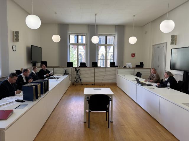 02 July 2025, Lower Saxony, Braunschweig: (L-R) Lawyers Heiko Bloch, Hartmuth Sager, Simon Marchlewski, and Michael Molitoris for the defence, and Kai Busch and Andrea Bästlein for the plaintiffs, sit in the regional court at the start of a civil trial. More than three years after the sinking of the car transport ship MS Felicity Ace, the proceedings concern claims for millions in damages. Photo: Maurice Dirker/dpa