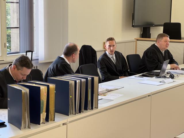 02 July 2025, Lower Saxony, Braunschweig: (L-R) Lawyers Heiko Bloch, Hartmuth Sager, Simon Marchlewski, and Michael Molitoris sit in the regional court at the start of a civil trial. More than three years after the sinking of the car transport ship MS Felicity Ace, the case involves claims for millions in damages. Photo: Maurice Dirker/dpa
