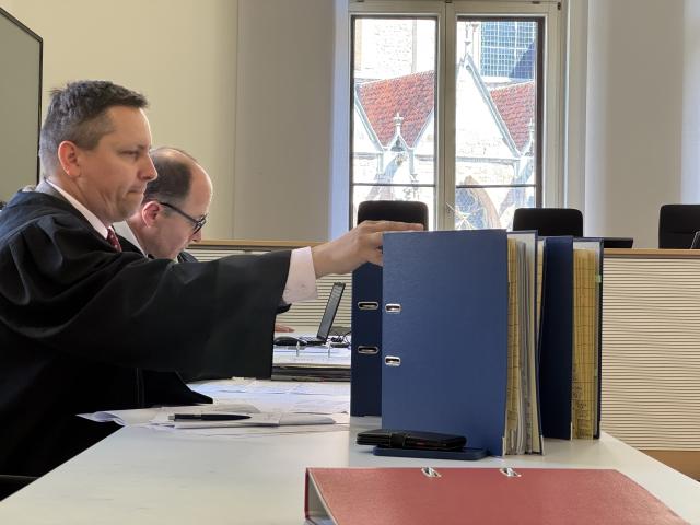 02 July 2025, Lower Saxony, Braunschweig: Lawyers Heiko Bloch (L) and Hartmuth Sager sit in the regional court at the start of a civil trial over millions in damages, more than three years after the sinking of the car transport ship MS Felicity Ace. Photo: Maurice Dirker/dpa