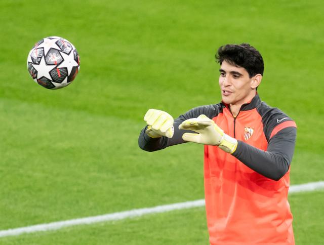 FILED - 08 March 2021, North Rhine-Westphalia, Dortmund: Then Sevilla goalkeeper Yassine "Bono" Bounou catches the ball prior to the start of the UEFA Champions League round of 16 soccer match between Borussia Dortmund and Sevilla FC at Signal Iduna Park. Photo: Bernd Thissen/dpa