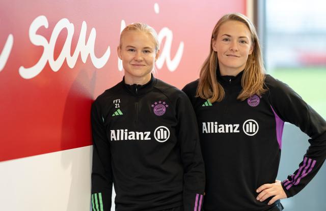 FILED - 12 December 2023, Bavaria, Munich: FC Bayern Munich's Pernille Harder (L) and Magdalena Eriksson pose for a photo on the sidelines of an interview. Pernille Harder and Magdalena Eriksson have long been regarded as role models for diversity in the football scene and now the dream couple will play against each other for first time at a European championship. Photo: Lukas Barth/dpa