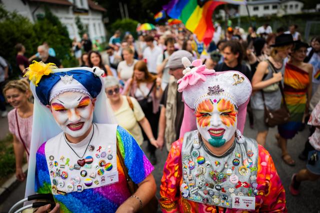 05 July 2025, Brandenburg, Falkensee: Sister Daphne (R) and Sister Sora take part in the Christopher Street Day (CSD) procession through Falkensee. Photo: Christoph Soeder/dpa