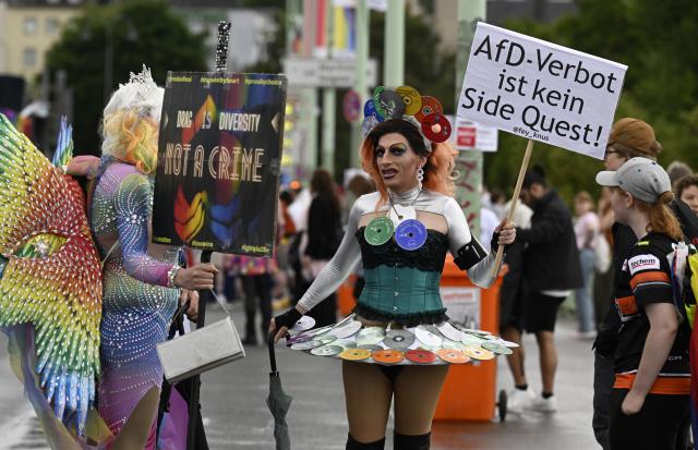 06 July 2025, North Rhine-Westphalia, Cologne: Participants in the Christopher Street Day (CSD) parade with colorful outfits celebrate their protest in the streets of the city for better rights for the LGBTQ community. Photo: Roberto Pfeil/dpa
