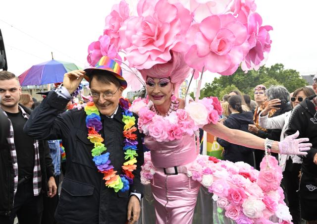 06 July 2025, North Rhine-Westphalia, Cologne: Former German health minister Karl Lauterbach takes part in the Christopher Street Day (CSD) parade. The demonstrators stand up for better rights for the LGBTQ community. Photo: Roberto Pfeil/dpa