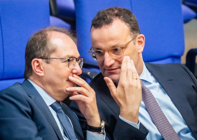 08 July 2025, Berlin: Jens Spahn (R), Christian Democratic Union of Germany / Christian-Social Union (cdu/csu) parliamentary group leader in the Bundestag, speaks with Alexander Dobrindt (CSU), German Minister of the Interior, in the Bundestag during the budget consultations on the introduction of the draft federal budget for 2025. Photo: Michael Kappeler/dpa