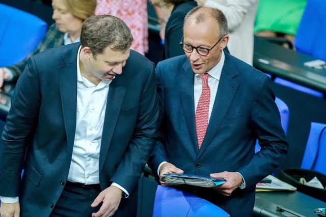 09 July 2025, Berlin: Lars Klingbeil (L), German Minister of Finance, Vice-Chancellor and SPD Federal Chairman, and German Chancellor Friedrich Merz take part in the general debate on the budget in the plenary session of the Bundestag. The general debate is the highlight of the budget week in the Bundestag. Photo: Kay Nietfeld/dpa