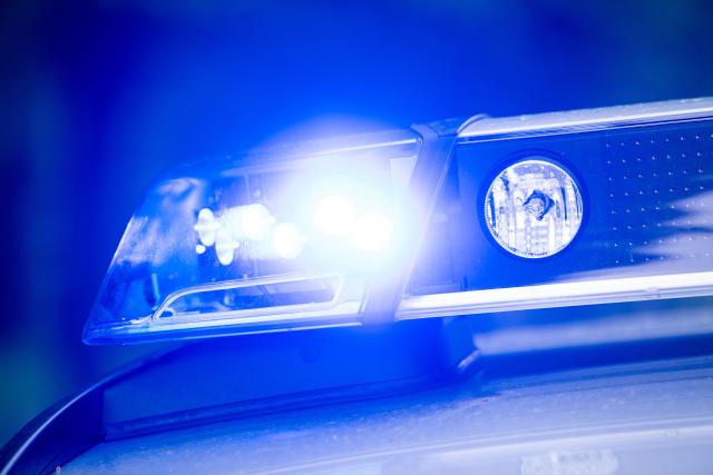 FILED - 15 May 2019, Bavaria, Dachau: A blue light shines on a police patrol. Investigators searched addresses in several German states and other European countries on Wednesday over suspicions of illegal online gambling. Photo: Lino Mirgeler/dpa
