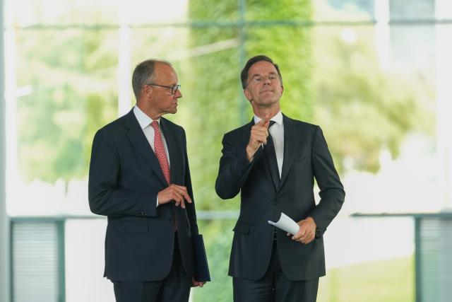 09 July 2025, Berlin: German Chancellor Friedrich Merz (L) and NATO Secretary General Mark Rutte arrive for a press conference in the Chancellery after their meeting. Photo: Soeren Stache/dpa