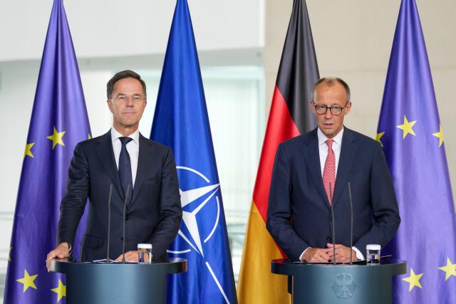 09 July 2025, Berlin: German Chancellor Friedrich Merz (R) and NATO Secretary General Mark Rutte speak during a press conference in the Chancellery after their meeting. Photo: Soeren Stache/dpa