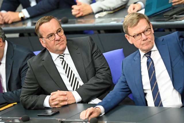 11 July 2025, Berlin: Boris Pistorius (L), German Minister of Defense, and Johann Wadephul, German Foreign Minister, sit in the Bundestag at the start of the session. One item on the Bundestag's agenda is the election of judges to the Federal Constitutional Court. Photo: Niklas Treppner/dpa