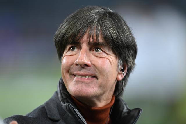 FILED - 11 November 2021, Lower Saxony, Wolfsburg: Former German national coach Joachim Loew reacts before the start of the 2022 FIFA World Cup European Qualifiers Group J soccer match between Germany and Liechtenstein at the Volkswagen Arena. Photo: Swen Pförtner/dpa