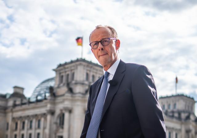 13 July 2025, Berlin: German Chancellor Friedrich Merz arrives for the ARD summer interview at the German public broadcasting network. In the live program *Bericht aus Berlin*, Merz speaks with ARD Hauptstadtstudio director Tina Hassel about current political issues. Photo: Michael Kappeler/dpa