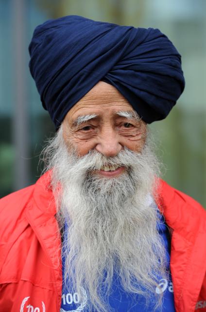 FILED - 30 October 2011, Hesse, Frankfurt_Main: British marathon runner Fauja Singh smiles prior to the start of the Frankfurt Marathon in Frankfurt am Main. Singh has died in a road accident in Punjab, India, aged 114. Photo: picture alliance / dpa