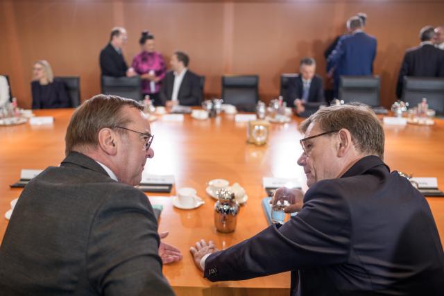 16 July 2025, Berlin: Boris Pistorius, German Minister of Defense, speaks with Johann Wadephul (R), German Minister of Foreign Affairs, before the start of the Federal Cabinet meeting in the Chancellery. Topics include a multi-year plan for growth in government spending, draft legislation to enshrine WHO regulations on combating the pandemic at national level. Photo: Michael Kappeler/dpa