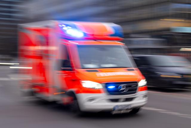 FILED - 08 February 2024, Berlin: An ambulance from the Berlin fire department drives to the scene with blue lights flashing. Photo: Monika Skolimowska/dpa