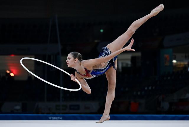 02 August 2025, Saxony, Dresden: Rhytmic Gymnast Anastasia Simkova performs her routine during the Individual all-around artistic Gymnastics competition of the German Athletics Championships in Dresden. Photo: Hendrik Schmidt/dpa