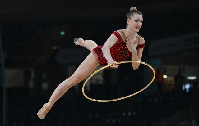 02 August 2025, Saxony, Dresden: Rhythmic Gymnast Margarita Kolosov performs her routine during the Individual all-around artistic Gymnastics competition of the German Athletics Championships in Dresden. Photo: Hendrik Schmidt/dpa