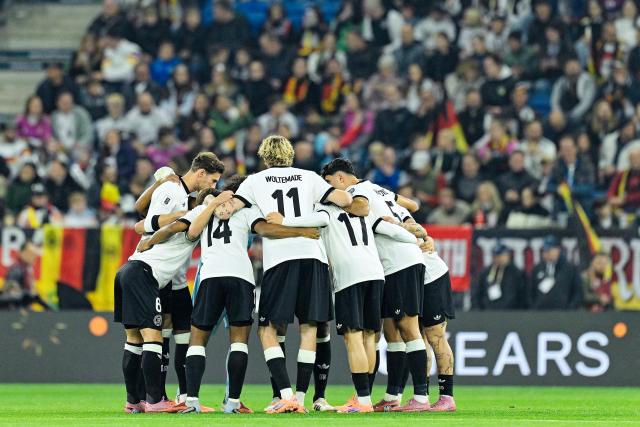 10 October 2025, Baden-Wuerttemberg, Sinsheim: German players form a circle ahead of the FIFA World Cup European Qualifying soccer match between Germany and Luxembourg at the PreZero Arena. Photo: Uwe Anspach/dpa