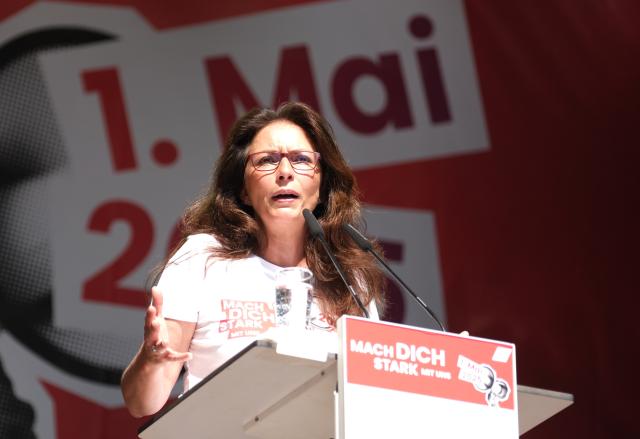 FILED - 01 May 2025, Chemnitz: Yasmin Fahimi, Chairwoman of the German Trade Union Confederation (DGB), speaks during a rally to mark the International Workers' Day in Chemnitz. Fahimi accused the German government of focusing on "completely the wrong side" in the debate over the social welfare system, warning of the risk of societal division. Photo: Sebastian Willnow/dpa