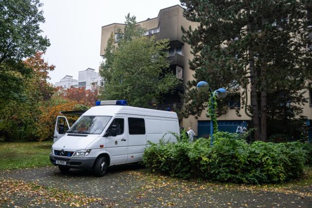 13 October 2025, Berlin: Forensics officers stand in a burnt-out apartment in Berlin-Neukoelln. Numerous people were injured in the fire. Photo: Fabian Sommer/dpa