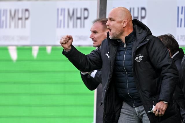 FILED - 06 October 2024, Baden-Wuerttemberg, Heidenheim: Then Leipzig's sporting director Rouven Schroeder celebrates after the German Bundesliga soccer match between 1. FC Heidenheim and RB Leipzig at Voith-Arena. Photo: Harry Langer/dpa