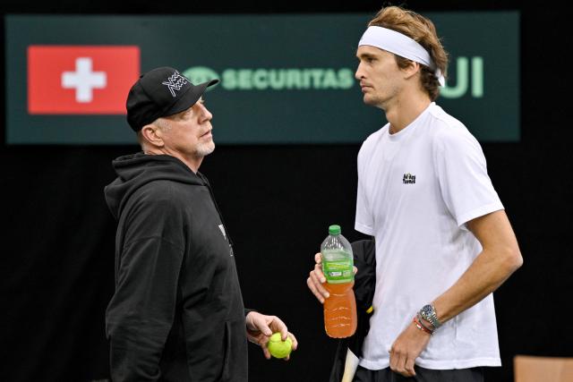 FILED - 03 February 2023, Rheinland-Pfalz, Trier: Former German tennis pro Boris Becker (L) stands with Alexander Zverev during a training session Men'at the Davis Cup. Photo: Harald Tittel/dpa