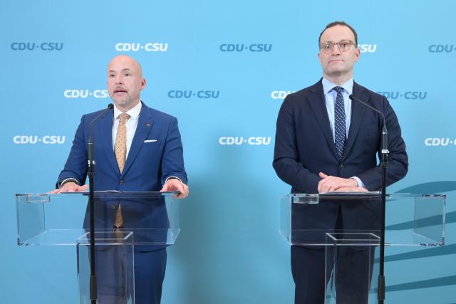 14 October 2025, Berlin: Chairman of the Christian Democratic Union/Christian Social Union (CDU/CSU) parliamentary group in the Bundestag Jens Spahn (R) and Chairman of the CSU parliamentary group in the Bundestag Alexander Hoffmann speak before a parliamentary group meeting. Photo: Niklas Graeber/dpa
