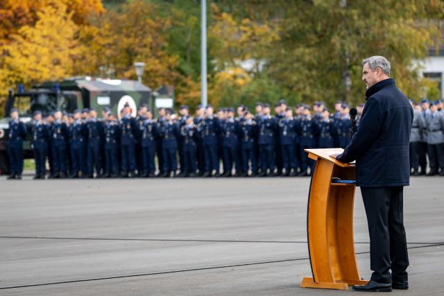 15 October 2025, Bavaria, Roth: Markus Soeder, Prime Minister of Bavaria speaks during the commissioning roll call of the Air Force Officers' School (OSLw) at the Otto Lilienthal Barracks in Roth. Photo: Daniel Karmann/dpa
