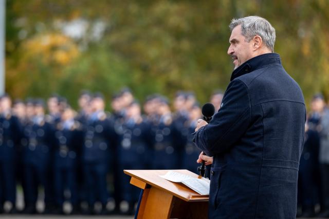 15 October 2025, Bavaria, Roth: Markus Soeder, Prime Minister of Bavaria speaks during the commissioning roll call of the Air Force Officers' School (OSLw) at the Otto Lilienthal Barracks in Roth. Photo: Daniel Karmann/dpa