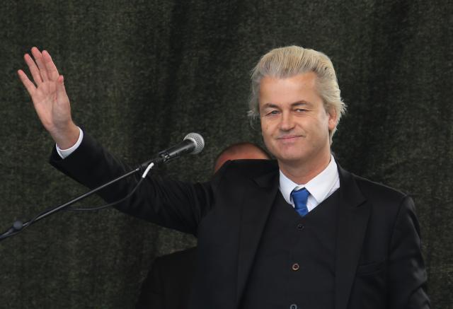 FILED - 12 April 2015, Saxony, Dresden: The Dutch right-wing populist Geert Wilders speaks at a rally organized by the extremist Pegida alliance in Dresden. Wilders has threatened to end the governing coalition if a draft bill for stricter asylum rules is watered down. Photo: Jan Woitas/dpa