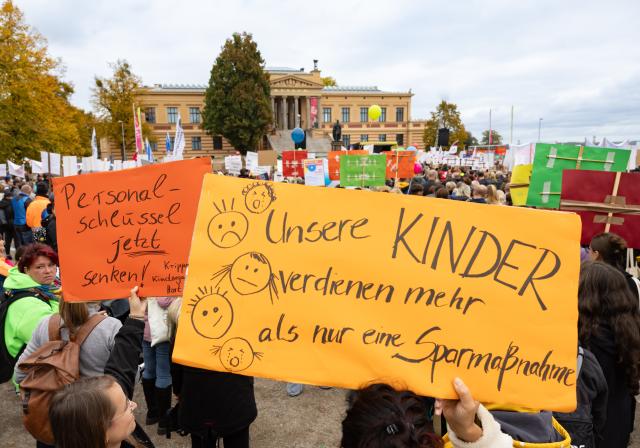 15 October 2025, Mecklenburg-Western Pomerania, Schwerin: Demonstrators hold placards during a protest organized by social organizations under the slogan "Respect instead of red pencil - MV remains social!". The protest event is directed against the state government's austerity plans, in particular against cuts in aid for people with disabilities. Photo: Ulrich Perrey/dpa