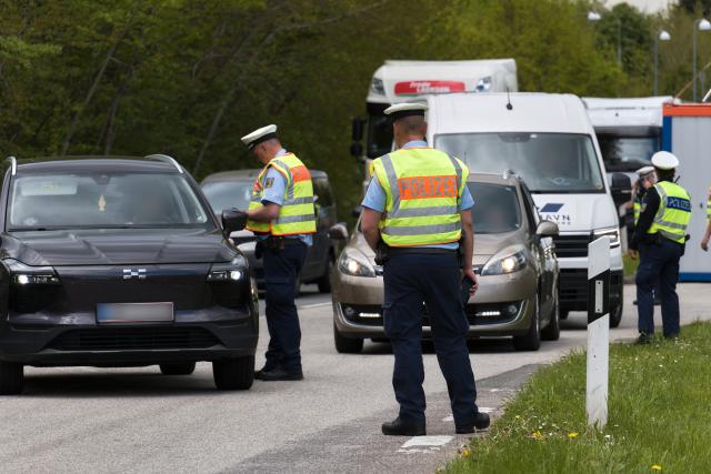 FILED - 08 May 2025, Schleswig-Holstein, Harrislee: Police officers carry out checks at the German-Danish border in the Schleswig-Flensburg district. Denmark has extended border controls along its border with Germany for a further six months, the Danish Justice Ministry announced in Copenhagen on Wednesday. Photo: Marcus Golejewski/dpa - ATTENTION: Person(s) and license plate number(s) have been pixelated for legal reasons