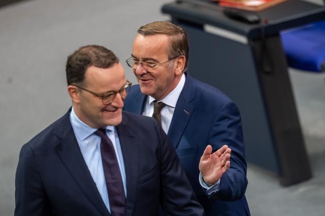 16 October 2025, Berlin: Boris Pistorius (R), German Minister of Defense, with Jens Spahn CSU parliamentary group leader in the Bundestag, before the debate in the Bundestag. In addition to the debate following Chancellor Merz's government statement, the parliament is also discussing pension legislation and the Military Service Modernization Act. Photo: Michael Kappeler/dpa