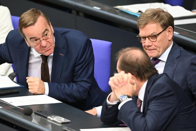16 October 2025, Berlin: Boris Pistorius (L-R), German Minister of Defense, speaks with Alexander Dobrindt, German Minister of the Interior, and Johann Wadephul, German Minister of Foreign Affairs, during the debate following the government statement on the EU summit in the Bundestag. In addition to the debate following Chancellor Merz's government statement, Parliament is also discussing pension legislation and the Military Service Modernization Act. Photo: Niklas Graeber/dpa
