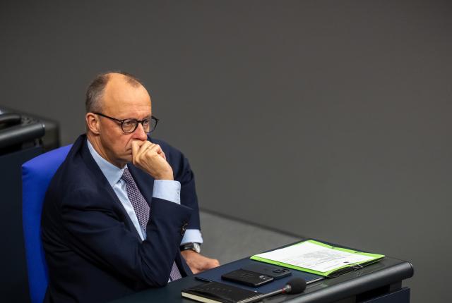 16 October 2025, Berlin: German Chancellor Friedrich Merz follows the debate in the Bundestag after the government statement on the EU summit. Among other things, parliament deals with pension laws and the Military Service Modernization Act. Photo: Michael Kappeler/dpa